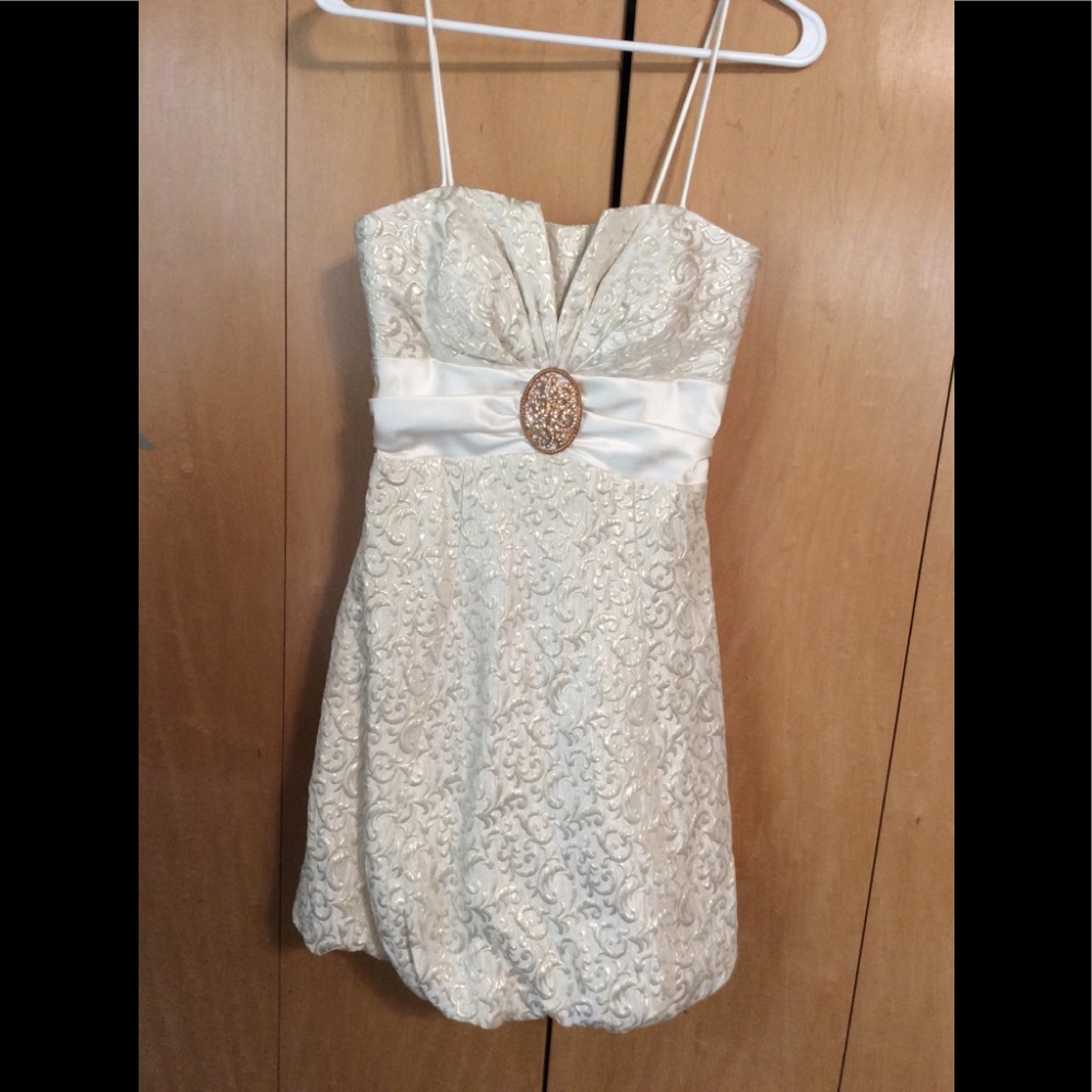 Ladies cream colored evening dress